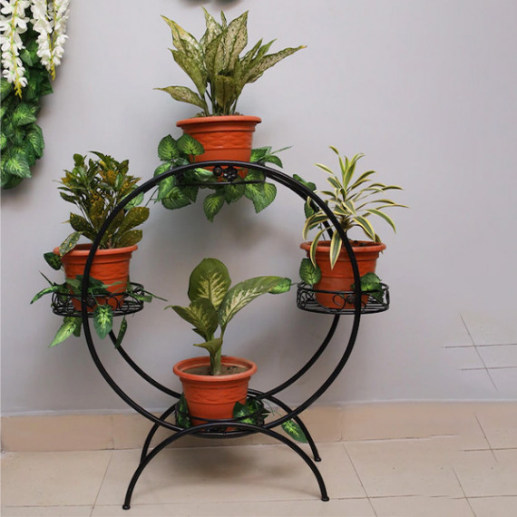 https://dailysales.in/products/set-of-4-black-solid-metal-planters-with-round-shaped-stand