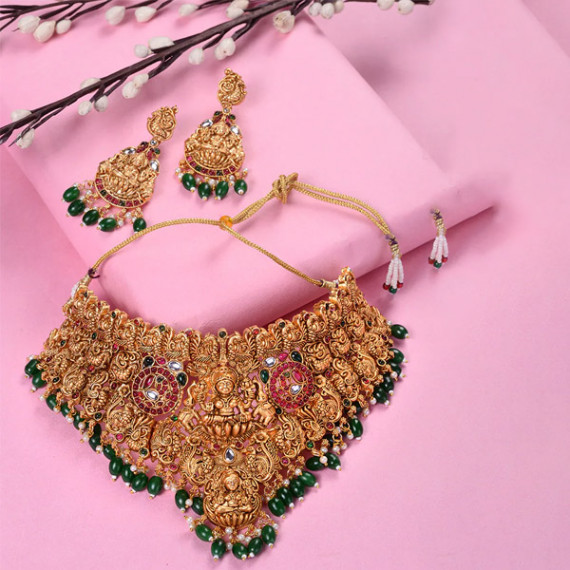 https://dailysales.in/products/gold-plated-kemp-stone-studded-lakshmi-design-with-dangling-green-beads-choker-set